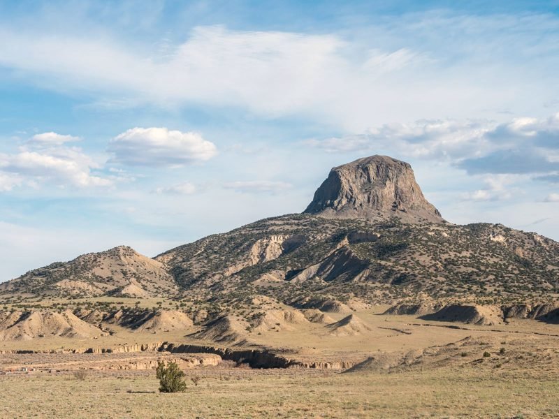 Cabezon Peak rising over rangeland in Sandoval County, New Mexico
